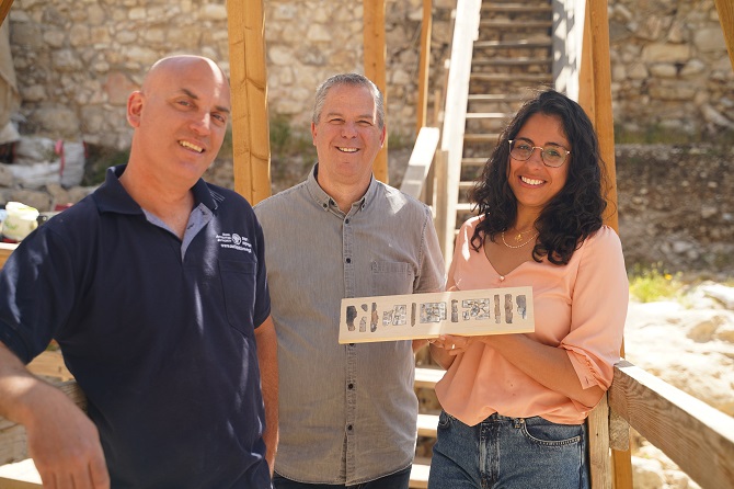 From right to left - Reli Avisher, Prof. Yuval Gadot and Dr. Yiftach Shalu with the rare find.