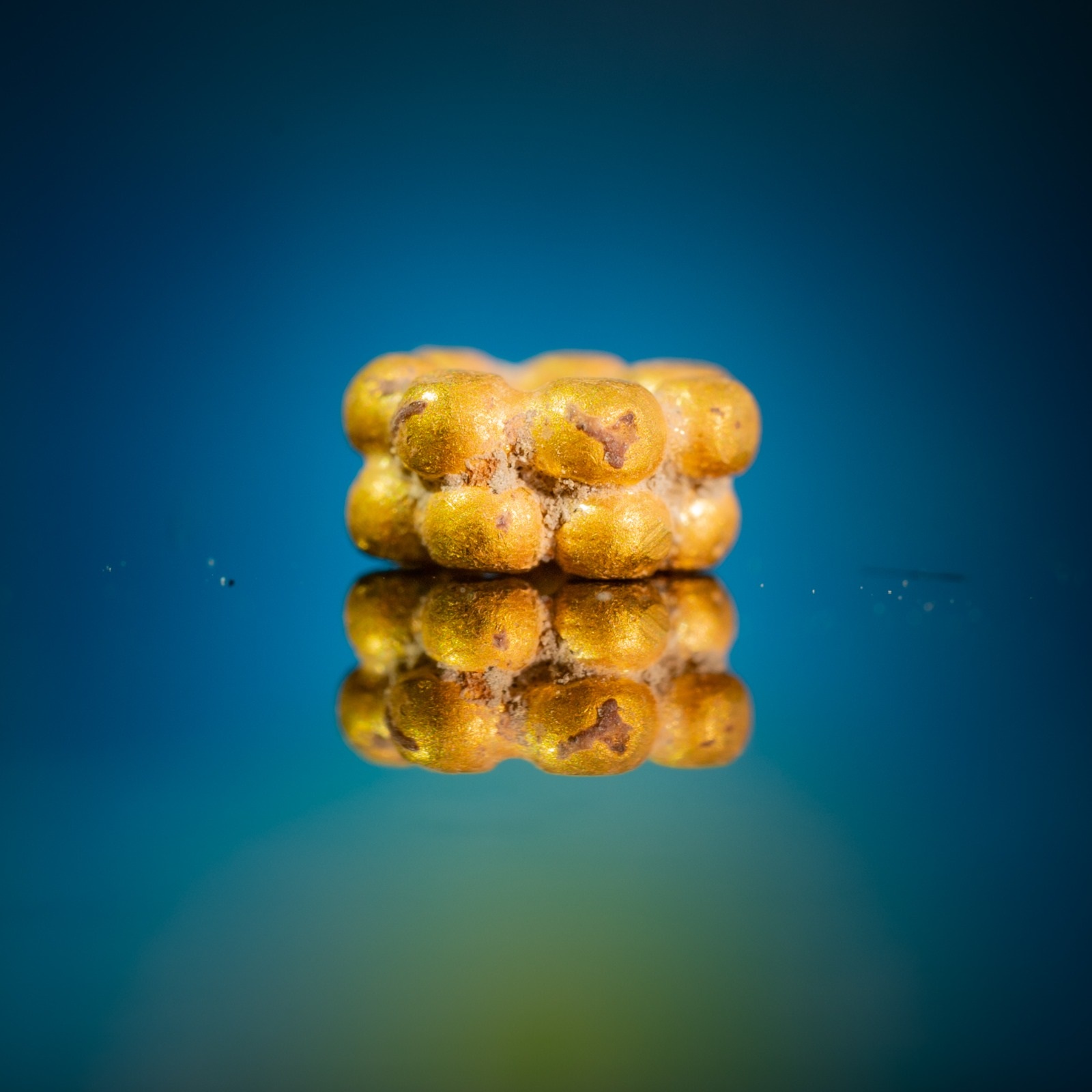 The gold bead which was discovered in Israel Antiquities Authority excavations in the City of David. Credit: Koby Harati, City of David